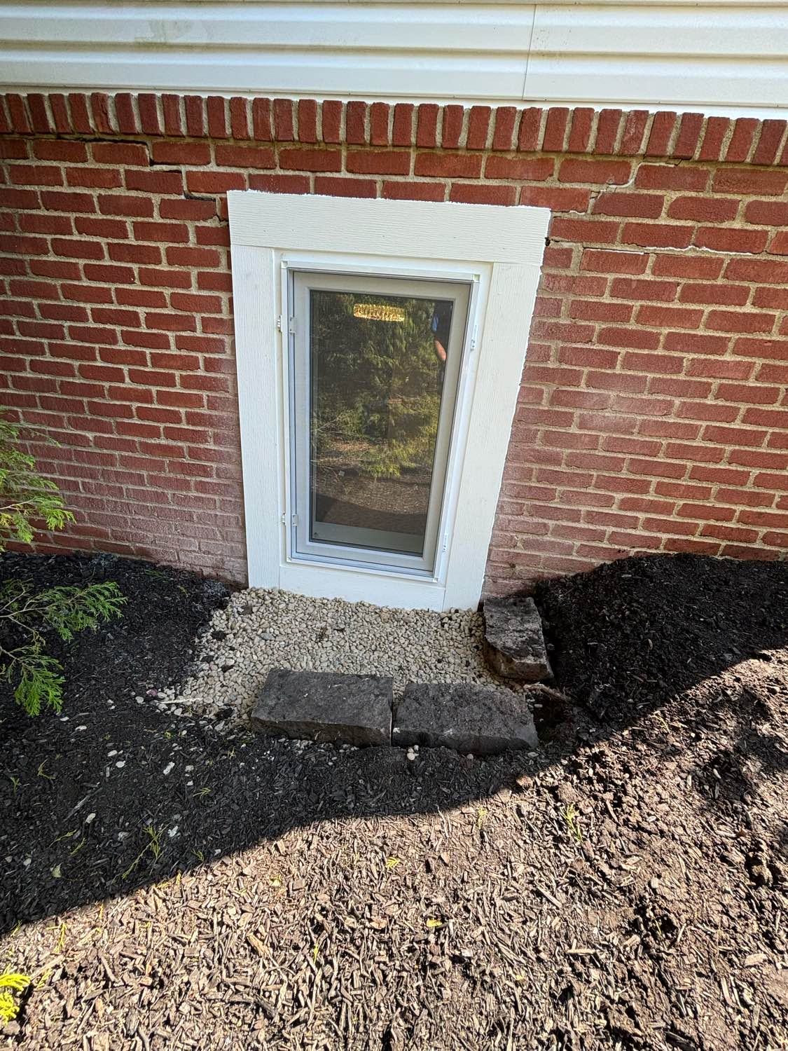 Egress window exterior installation by All Basement Windows in Ohio