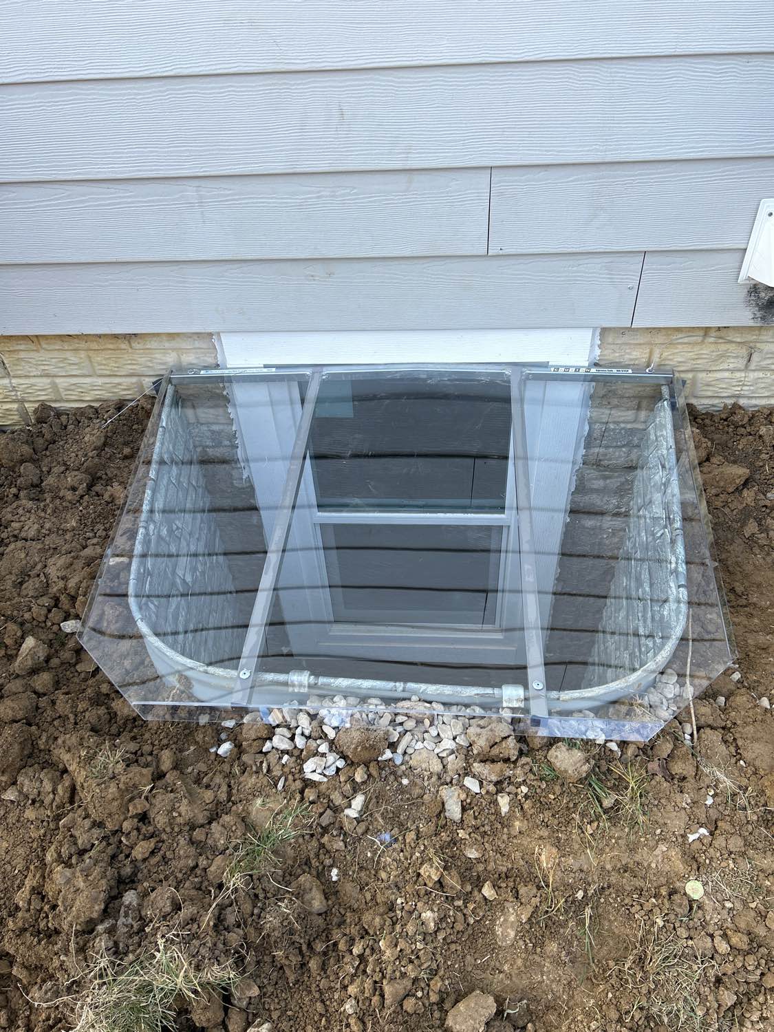 Completed egress window installation by All Basement Windows crew